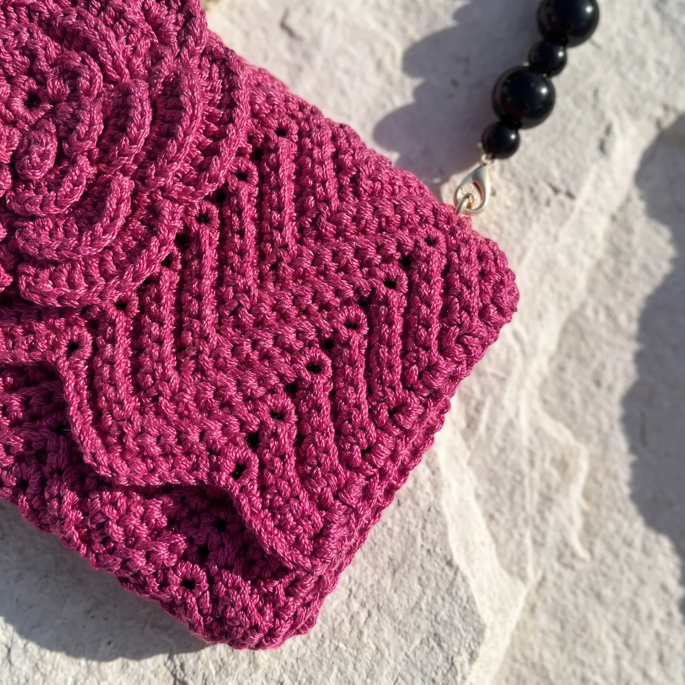 Anemóni — stitch and hardware detail