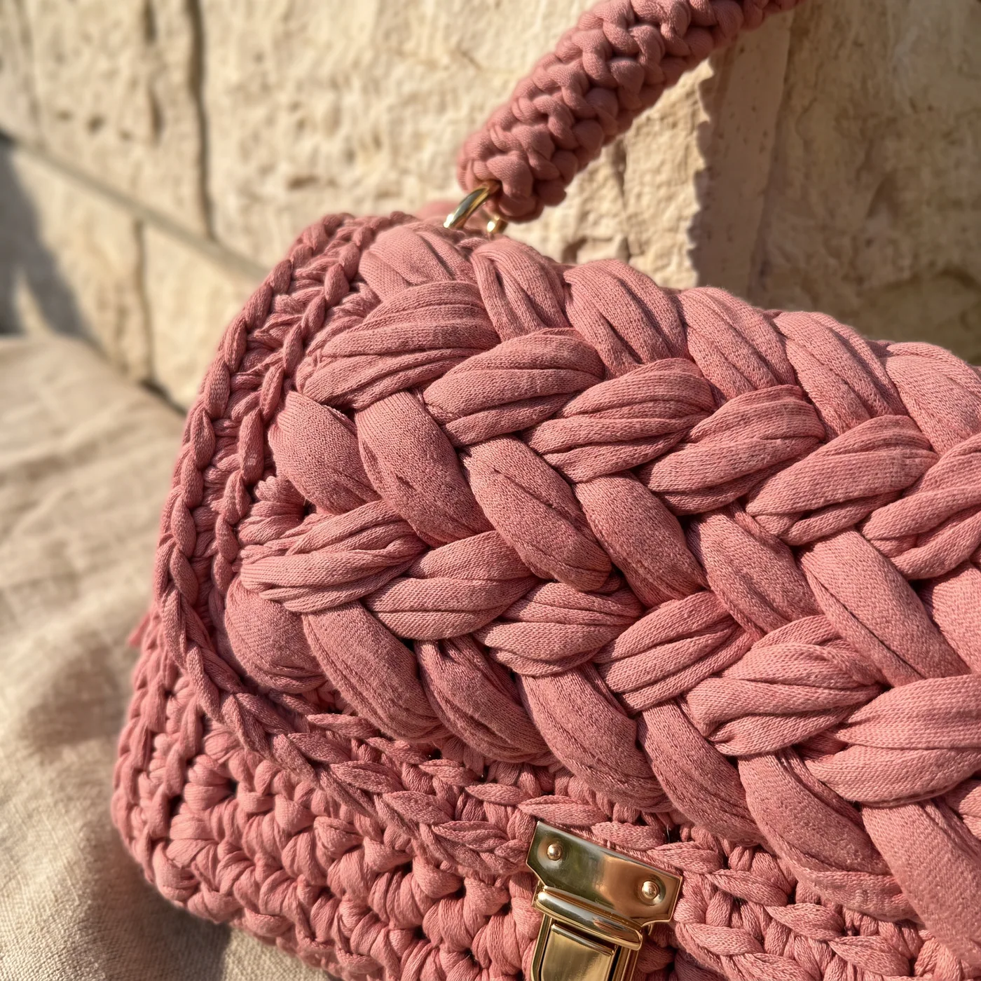 Folégandros — stitch and hardware detail