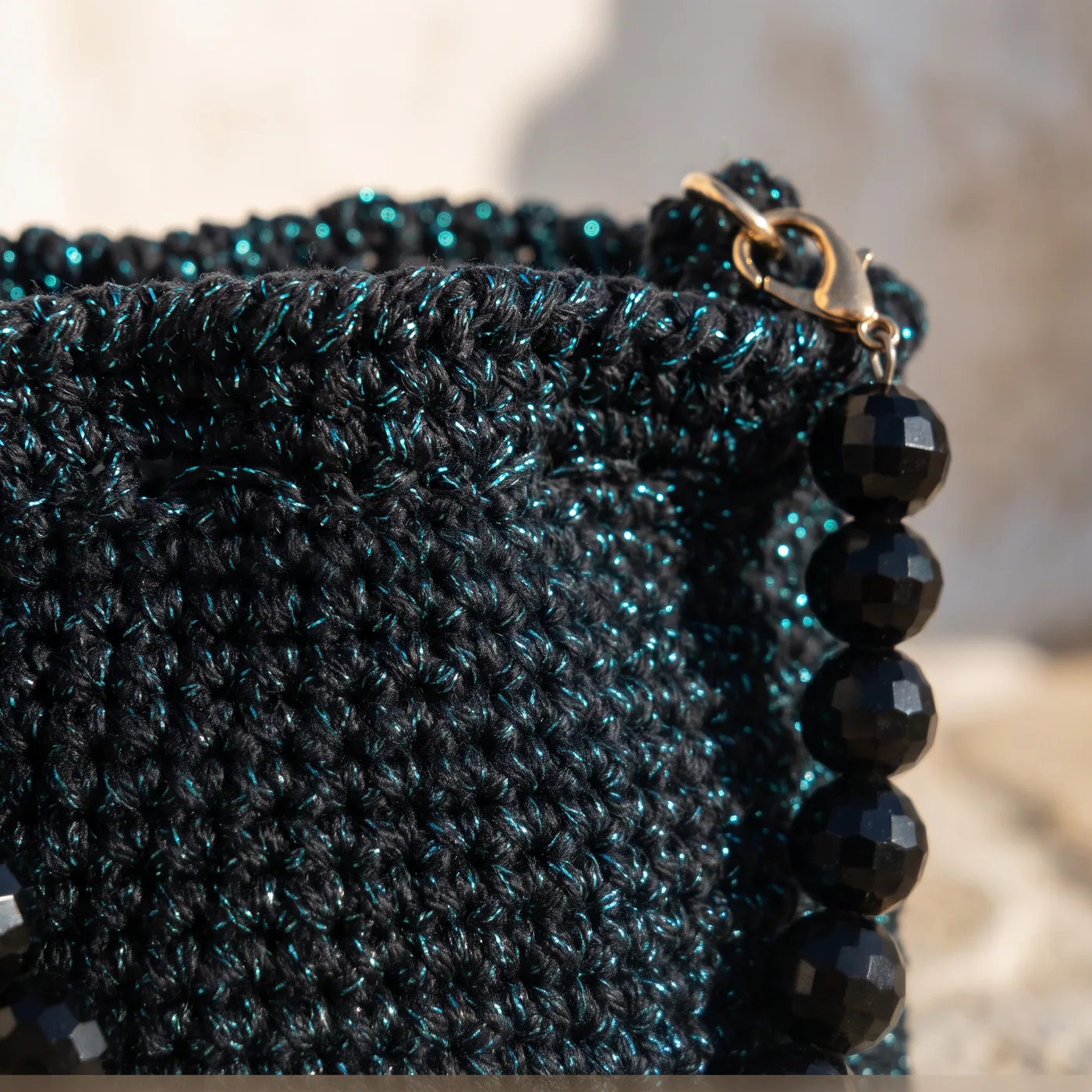 Nyx — stitch and hardware detail