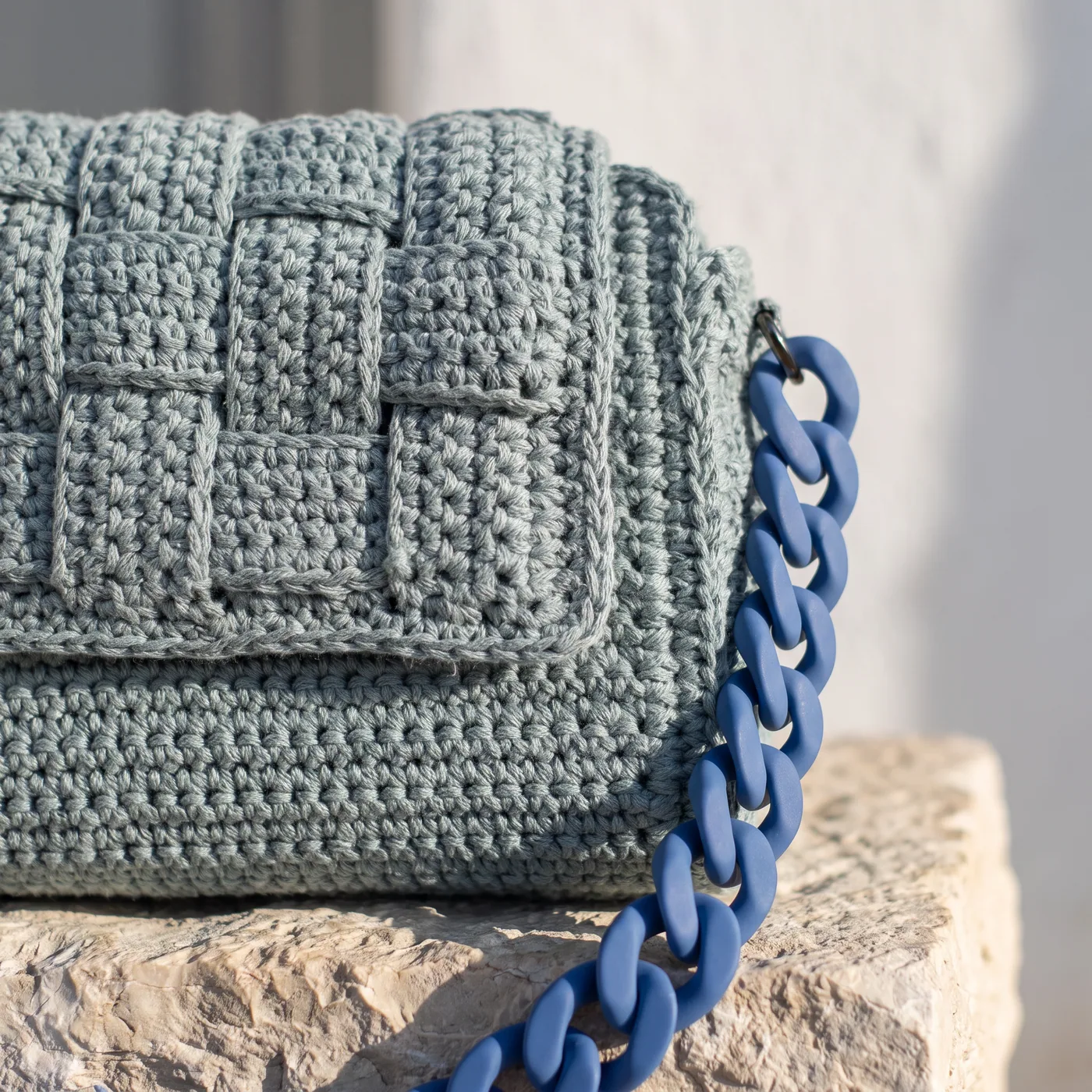Sýros — stitch and hardware detail